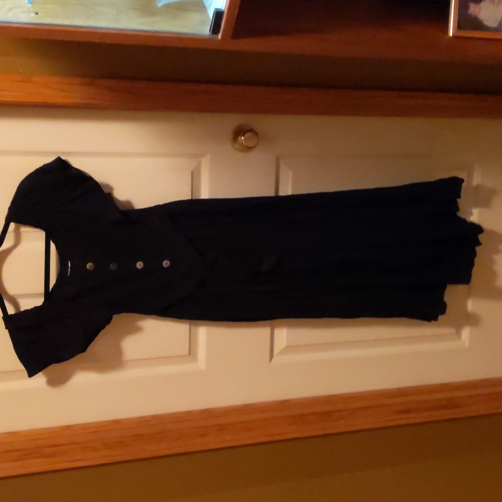 Black romper with wooden buttons